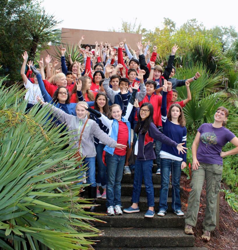 57 Hall County Middle School students from World Language Academy in Flowery Branch, GA, their teachers and curator Karen Moss Bryan (front right) at the Latin American Ethnobotanical Garden to tour the garden and carry out a plant propagation activity on November 3, 2015.