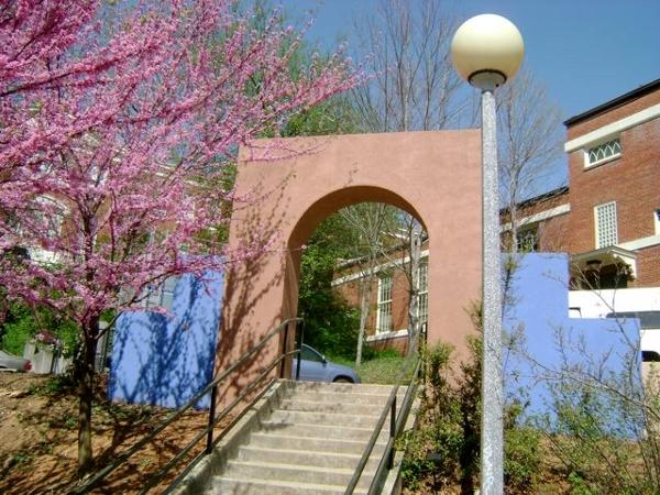 April 2010 image of new entry portal with Redbud trees in full bloom.