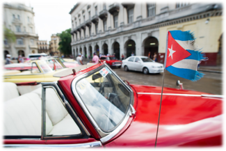 vintage car with cuban flag